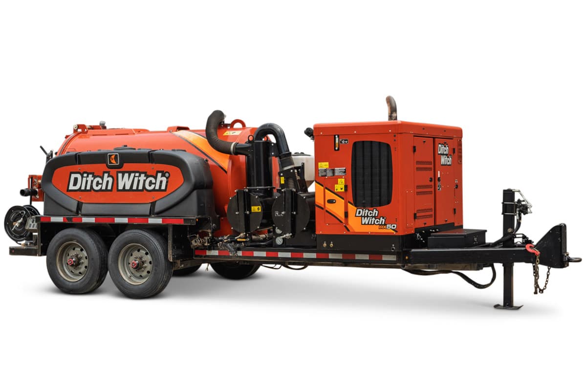 2023 Ditch Witch HX50 mud recycler, trailer-mounted, tandem axle, orange vacuum tank, engine enclosure, hose connections, 3/4 view