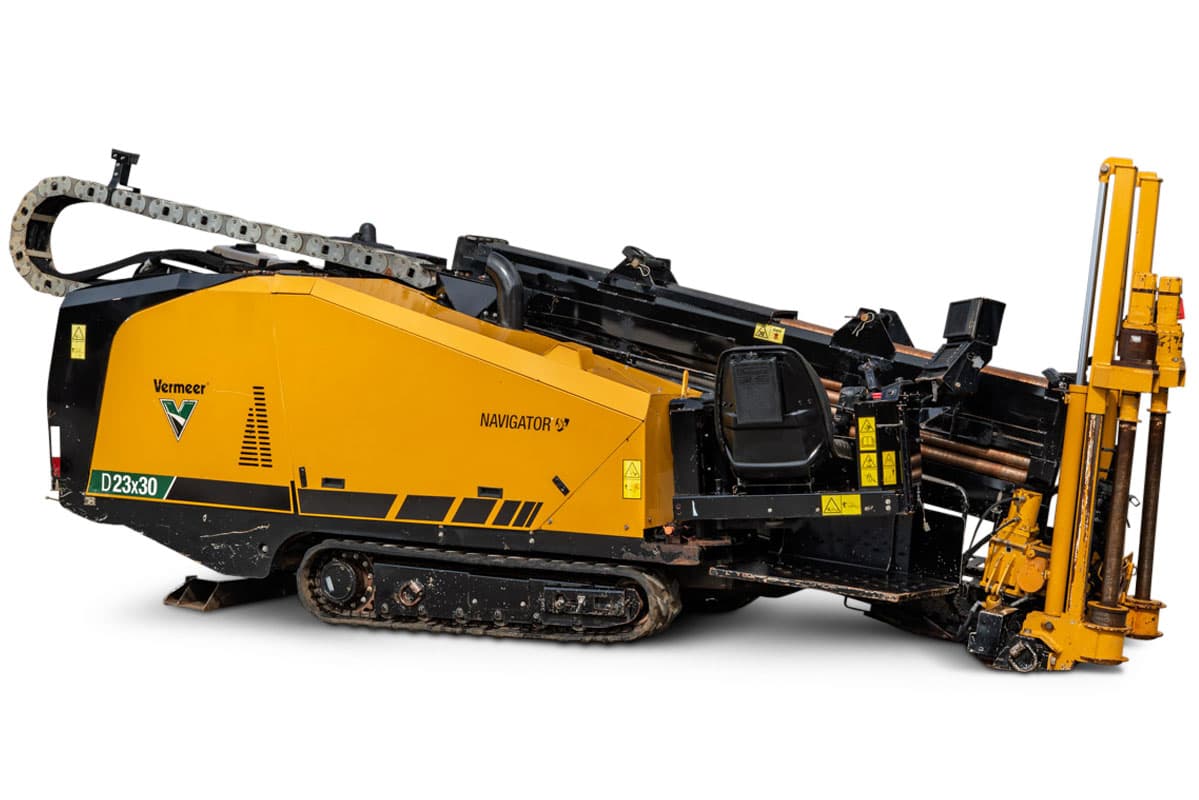 2021 Vermeer D23x30 S3 HDD drill, 3/4 angle, yellow/black, rubber tracks, drill pipe loaded, carriage assembly visible