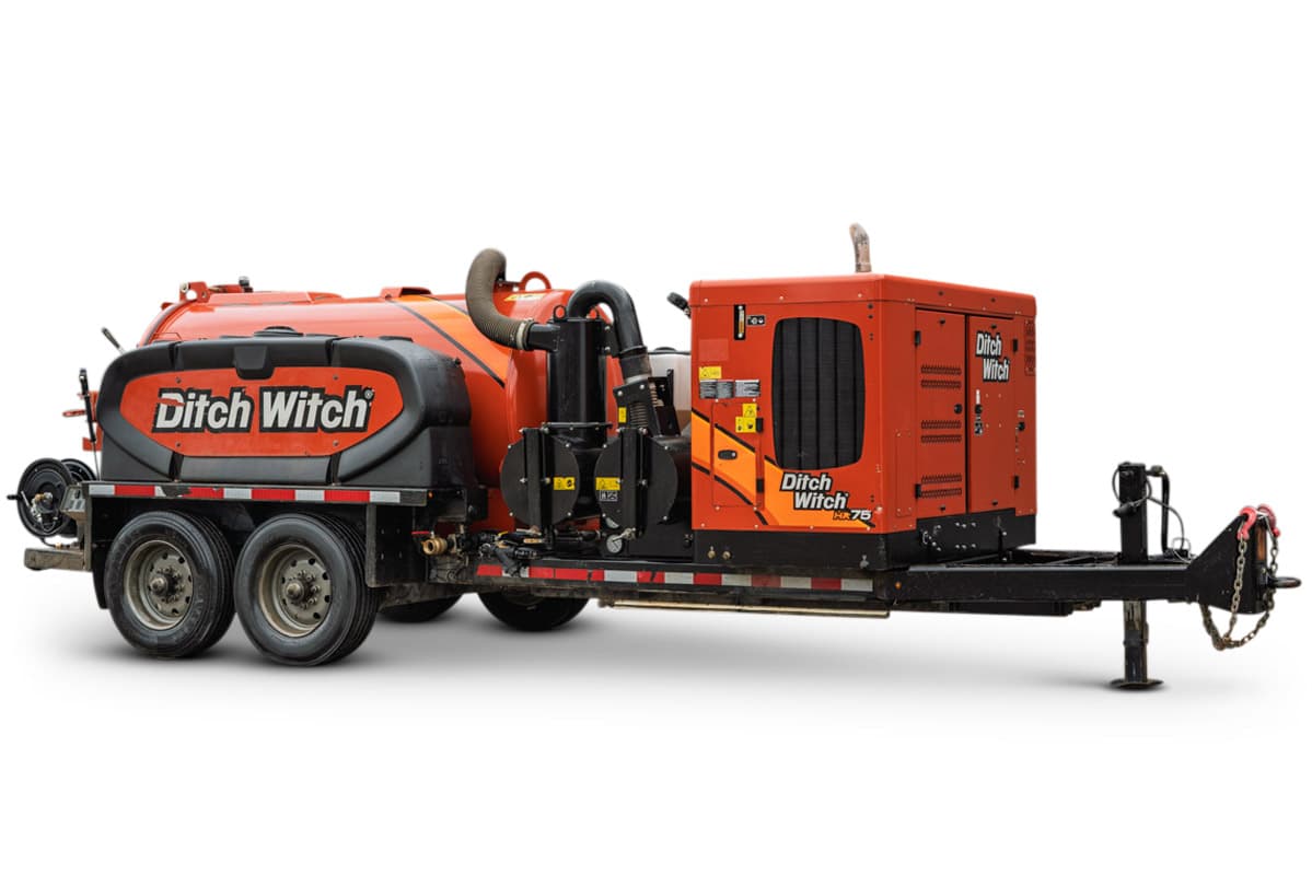 2023 Ditch Witch HX75 mud recycler on tandem-axle trailer; orange tank, vacuum hoses, engine compartment, tongue jack visible