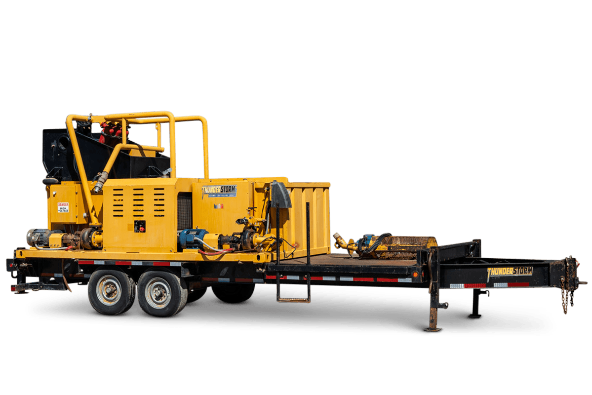 2015 Vermeer Thunderstorm HDD mud recycler on tandem-axle trailer, 3/4 view, yellow, dual pumps, hydraulic plumbing, engine compartment visible