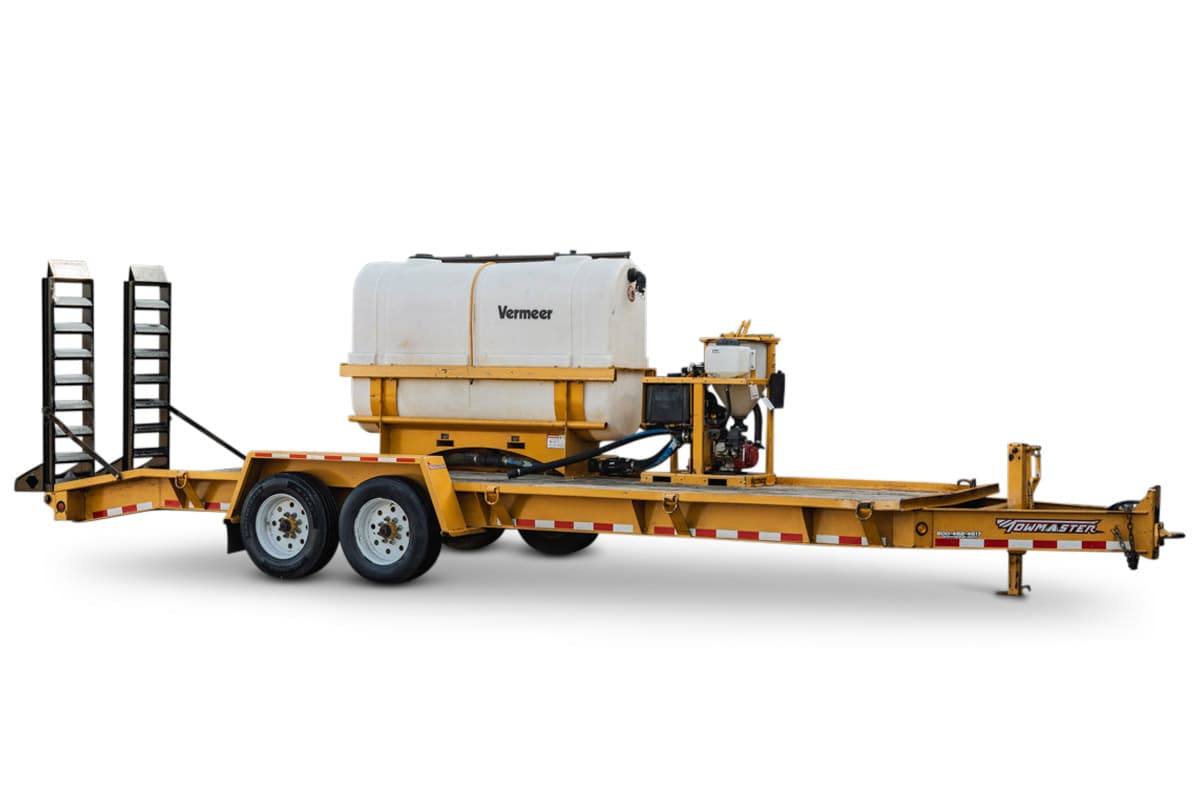 2021 TowMaster T-20D yellow tandem-axle trailer with Vermeer MX125 mud mixing system, poly tank, engine, and fold-down ramps