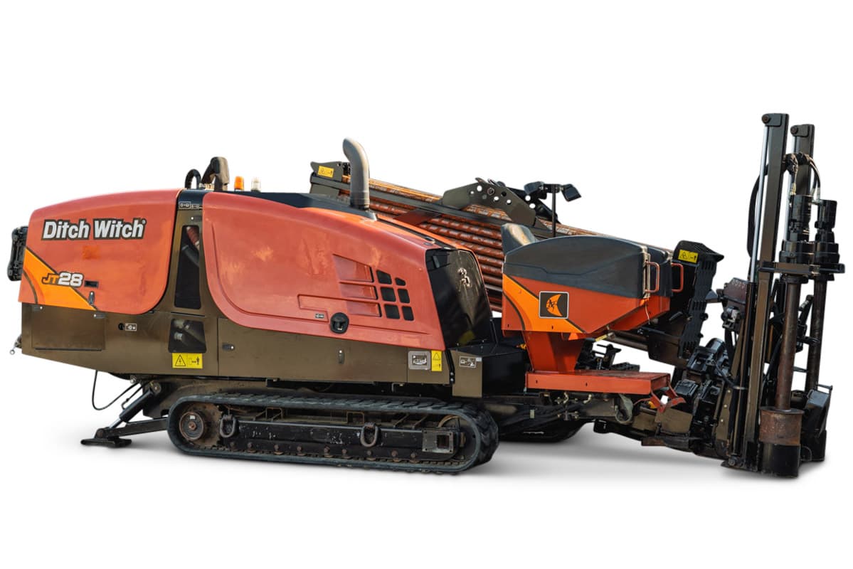 2021 Ditch Witch JT28 HDD drill, side view, rubber tracks, loaded drill pipe rack, carriage assembly, used condition