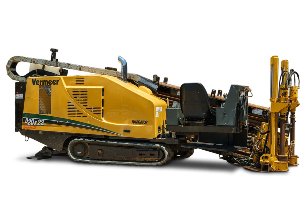 2015 Vermeer D20x22 Series II HDD rig, 3/4 left side view, yellow, steel tracks, loaded drill pipe rack, operator seat, vise assembly, cable carrier arm visible