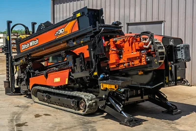 2016 Ditch Witch JT30 All Terrain HDD drill, side profile view showing carriage, tracked undercarriage, and stabilizer legs.