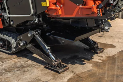 2022 Ditch Witch JT20 hydraulic anchoring system with extended ground anchors, rubber tracks, and undercarriage detail