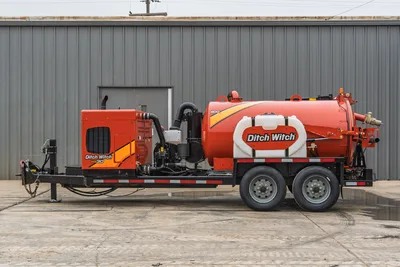2019 Ditch Witch HX30 vacuum excavator, side profile showing engine compartment, 800-gallon spoil tank, and tandem axle.