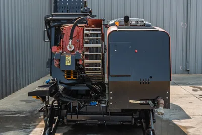 2017 Ditch Witch JT30 HDD drill, rear view showing carriage, rotary drive, drill frame, engine compartment, hydraulic lines, and tracks.