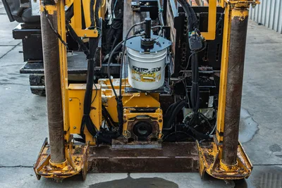 2019 Vermeer D40x55 S3 front-end vise, anchor posts, and Thread Pro lubrication system, front view, used condition