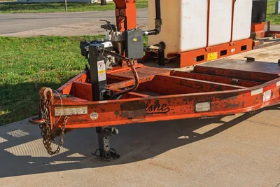 Belshe WB14-2EP trailer tongue, jack, chains, with a Ditch Witch FM5x system component visible.