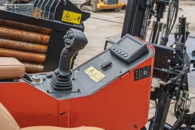 Ditch Witch JT25 operator station display, joystick controls, and drill pipe rack housing in overhead perspective.