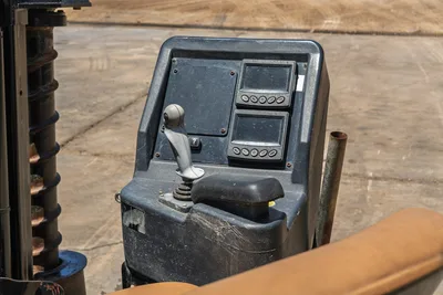 2018 Ditch Witch JT30 All Terrain operator console with dual display monitors, joystick controls, and drill pipe visible at left