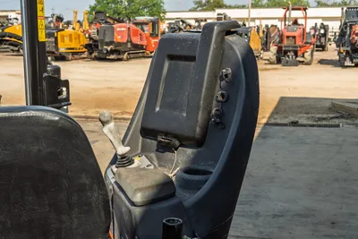 2020 Ditch Witch JT24 operator station, joystick controls, contoured seat, and control console in clean condition.