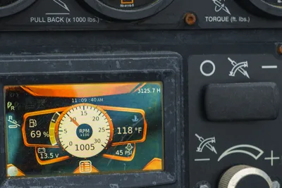 Ditch Witch JT20 operator control panel displaying 3,125.7 hours, RPM gauge, pullback and torque indicators, 45 PSI, 118°F
