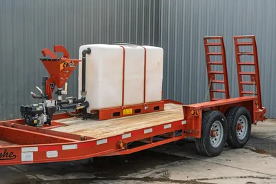 2019 Belshe WB14-2EP mud mixing trailer, 3/4 view, white poly tank, Ditch Witch FM5X mixer, gas engine, wood deck, dual axle, fold-down ramps
