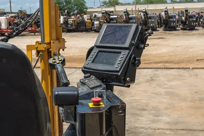2021 Vermeer D24x40 S3 operator console with dual display screens, joystick controls, keypad, and red emergency stop button