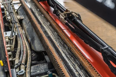 Ditch Witch JT20 drill pipe and hydraulic hose assemblies, close-up detail view showing 2.06" diameter pipe and operational components
