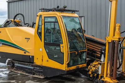 2017 Vermeer 40x55 S3 horizontal directional drill, side view showing enclosed cab, tracks, drill pipe, and rack system.
