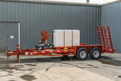 2019 Belshe WB14-2EP mud mixing trailer, side view, red frame, white poly tank, Little Witch mixer, tandem axle, ramp tail