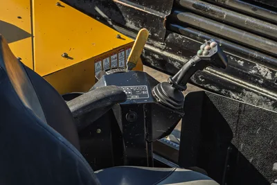 2016 Vermeer D23x30 S3 operator controls — joystick, throttle lever, control console, drill pipe rack visible in background