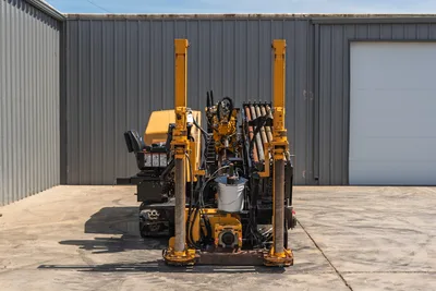 2020 Vermeer D24x40 S3 HDD drill, rear view showing carriage, anchor posts, drill pipe rack, hydraulic lines, and operator seat