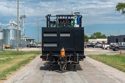 2023 American Augers M300DH mud recycler, rear view, trailer hitch, outriggers, vented engine enclosure, shaker deck, mixing system visible above