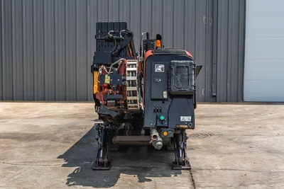 2017 Ditch Witch JT20 HDD rig, rear view, drill pipe carousel, hydraulic lines, operator console, anchor legs, rubber tracks visible