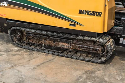 2014 Vermeer 24x40 Series II side profile focusing on heavy-duty rubber tracks, undercarriage, and Navigator cowling.