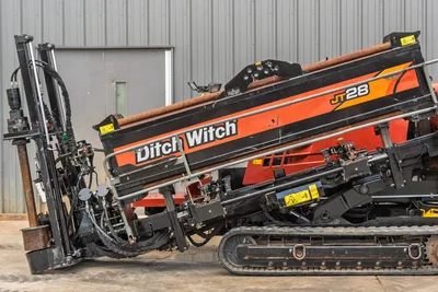 2021 Ditch Witch JT28 HDD drill, driver-side profile view, angled drill frame, hydraulic carriage, rubber tracks, used condition