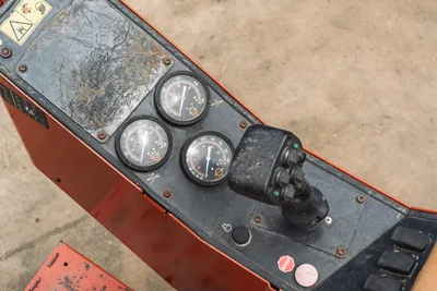 Overhead view of 2021 Ditch Witch JT25 operator control station featuring hydraulic pressure gauges and joystick controller.