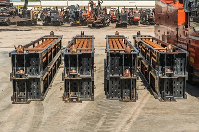 2014 Ditch Witch JT100 Mach 1 HDD drill pipe racks with 3.5" used drill pipe, surface rust, heavy-duty steel frames