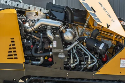 2022 Vermeer D23x30 S3 Navigator open engine compartment showing diesel engine, exhaust, hydraulic manifold, and clean components