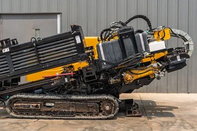 Side profile of 2014 Vermeer 24x40 Series II HDD, showing drill rack, tracks, hydraulic lines, and engine housing components.