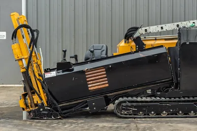 2018 Vermeer D8x12 HDD drill, side view, yellow drill frame angled down, operator seat, rubber tracks, used condition