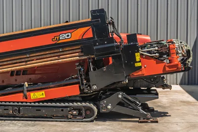 2021 Ditch Witch JT20 horizontal directional drill side profile showing drill pipe rack, tracks, and stabilizer leg.