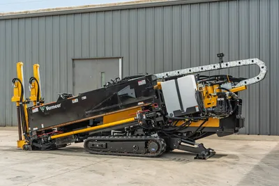 2024 Vermeer D20x22 S3 HDD drill, driver-side angle, rubber tracks, drill pipe loaded, hydraulic hose carrier arch, yellow anchors visible