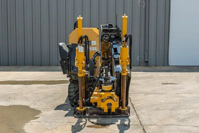 Vermeer 10x15 S3 HDD machine front view, yellow frame with dual thrust cylinders, 60 hp engine, rotational drive head, 1,500 ft-lb torque capacity