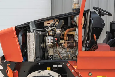 Engine compartment of 2017 Ditch Witch RT80 utility trencher, side profile view showing radiator and turbo components.