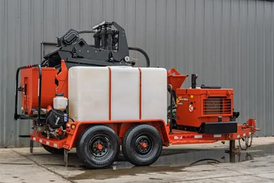 2015 Ditch Witch MR90 mud recycler, 3/4 rear view, tandem-axle trailer, white poly tank, mixing hopper, pump assembly, engine compartment