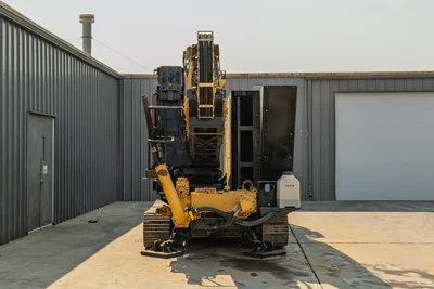2017 Vermeer D100x140 S3 HDD drill, rear view, drill frame/carriage, hydraulic cylinders, steel tracks, open engine panels