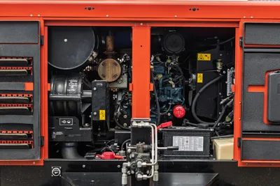 2023 Ditch Witch HX50 mud mixer open engine compartment showing Kubota diesel, pump drive, hydraulic components, and battery