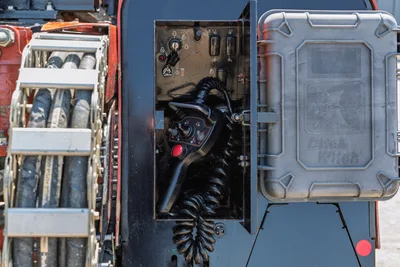 2022 Ditch Witch JT20 operator control panel with joystick, toggle switches, drill pipe rack visible left side