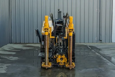 2021 Vermeer D23x30 S3 HDD rig rear view showing drill carriage, vise assembly, anchor posts, and hydraulic lines