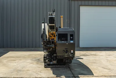2022 Vermeer D23x30 S3 HDD drill, rear view, rubber tracks, drill frame, operator controls panel, fluid tank, yellow locator rod visible