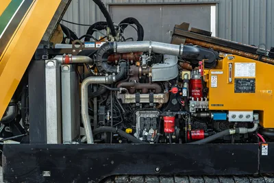 2019 Vermeer D40x55 S3 open engine compartment showing diesel engine, turbo, hydraulic filters, and fluid reservoirs