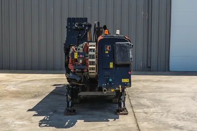 Rear view of 2021 Ditch Witch JT20 HDD drill showing drill pipe rack, engine housing, stabilizer legs, and hydraulic controls.