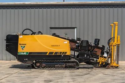 2020 Vermeer D24x40 S3 Navigator HDD drill, full profile view, rubber tracks, loaded drill pipe carousel, yellow hood