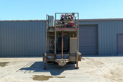 2018 Mud Technologies MCT-450 rear view on trailer, showing diesel engine, red motor, pump manifold, access ladder, and standpipe