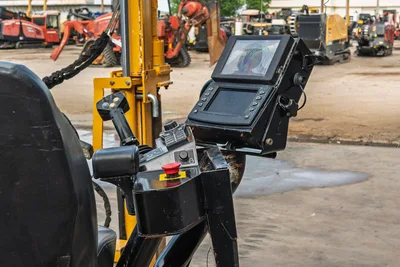 2018 Vermeer D24x40 S3 operator console with dual display screens, joystick controls, red E-stop button, worn finish