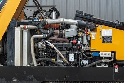 2017 Vermeer 40x55 S3 engine compartment view, highlighting the 140 hp diesel motor, turbocharger, and cooling system.