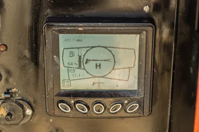 2022 Ditch Witch HX30 digital display panel showing 482.7 hrs, 64% fuel level, 12.1V battery, with control buttons
